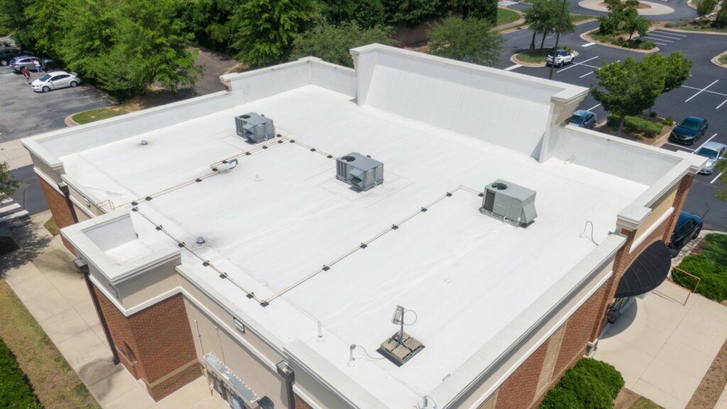 White commercial flat roof from above